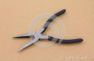 Opened needle-nose pliers Stock Photo