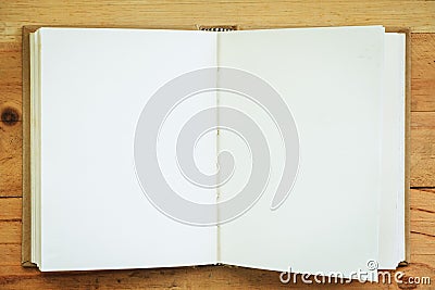 Opened notebook on wooden background Stock Photo