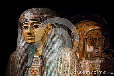 Opened old wooden sarcophagus of a pharaoh from ancient Egypt. exhibition Gods of Egypt. Editorial Stock Photo