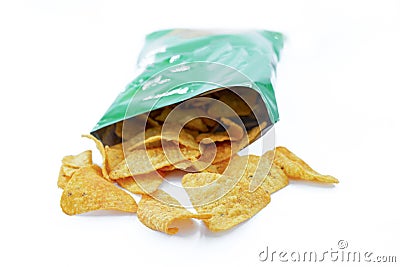 Opened pack of delicious spicy nachos over white background Stock Photo