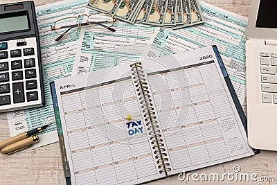 Opened schedule with note on April 15th. Tax day, deadline Editorial Stock Photo