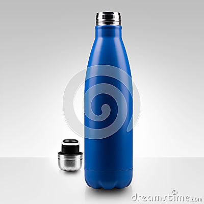 Opened stainless thermo water bottle, close-up on white background. Stock Photo