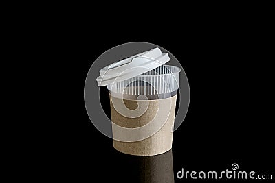 Opened take-out coffee with cup holder. Isolated on black background with Reflections Stock Photo