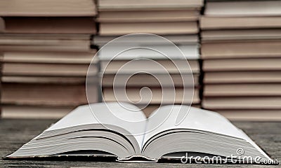 Opened thick book. Symbol of wisdom Stock Photo