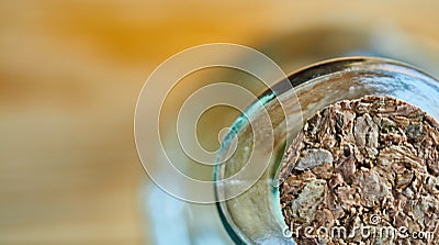 Opening of a carafe of glass closed with a cork of natural cork, cut, close-up with blurred background Stock Photo