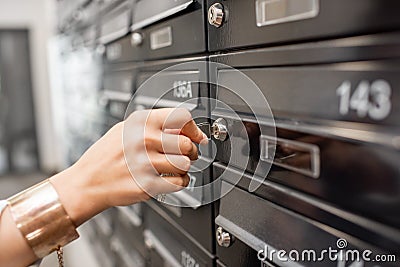 Opening postbox Stock Photo