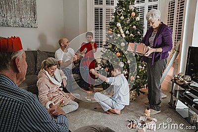 Opening Presents On Christmas Morning Stock Photo