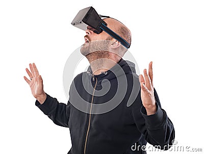 Openmouthed and excited man play game with virtual reality device Stock Photo