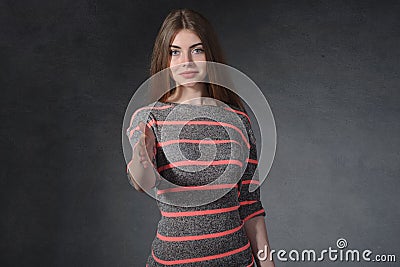 Openness, friendship concept. Female extends a hand to explore Stock Photo