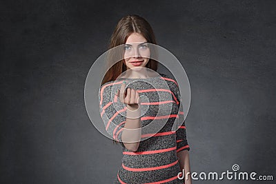 Openness, friendship concept. Woman attracts finger a Stock Photo
