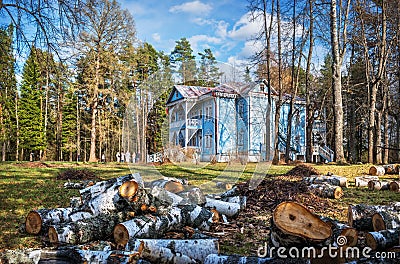 House of the Snow Maiden and birch firewood in the forest of the estate of A.N. Ostrovsky Shchelykovo, Kineshma Stock Photo