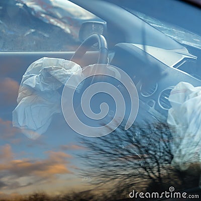 Operated airbags in a car.Worked airbags in a broken car. Stock Photo