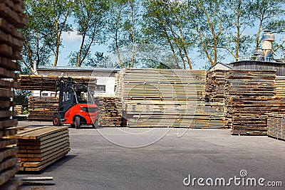 Operating Forklift Truck In Lumber Industry Stock Photo
