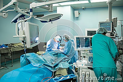 Operating room, surgeons perform an operation, a team of professional surgeons working in the operating room with modern Stock Photo