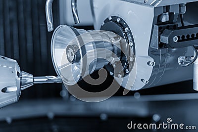 The operation of cutting tool making machine control by CNC program. Stock Photo
