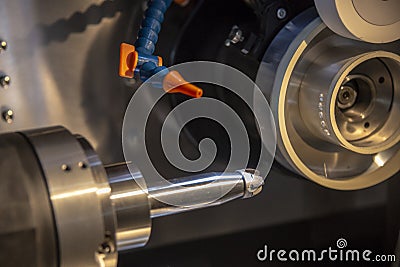 The operation of cutting tool making machine control by CNC program. Stock Photo
