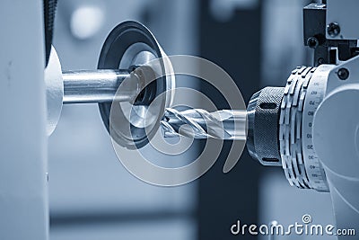 The operation of cutting tool making machine control by CNC program. Stock Photo