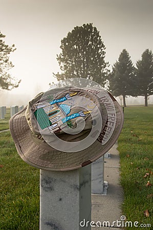 Operation Iraqi Freedom Hat on Veteran's Tombstone Stock Photo