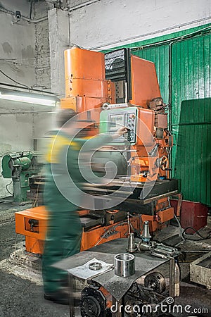 operation of a metal blank on turning machine with cutting tool Stock Photo