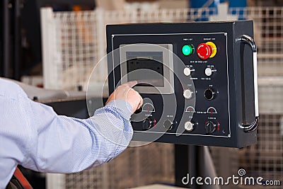 Operator of CNC machine Stock Photo