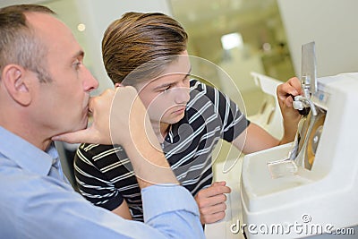 ophtalmologist with young patient Stock Photo