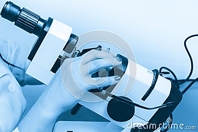 The ophthalmologist determines the optical power of the spectacle lenses and the lens centers on the optical stand. Stock Photo