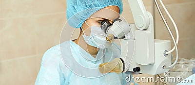 Ophthalmology laser microscope operation. Doctor in clinic. Patient eye treatment. Myopia and cataract removal Stock Photo