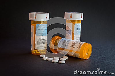 Opioid Crisis - Open Bottle of Prescription Painkillers. Medicare, overdose. Stock Photo