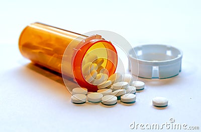 Opioid Crisis - Open Bottle of Prescription Painkillers Stock Photo