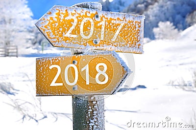 2017 and 2018 on opposite direction panels Stock Photo