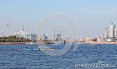 The cruiser `Aurora` and the building of the Nakhimov school. St. Petersburg. Editorial Stock Photo