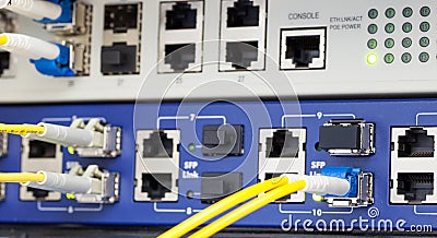 Optic fiber and SFP connected to switch Stock Photo