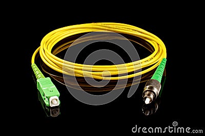 Optical fiber cable isolated on the black background Stock Photo