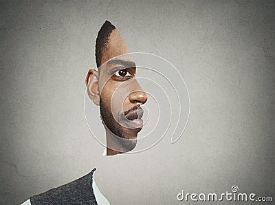 Optical illusion portrait front with cut out profile of a man Stock Photo