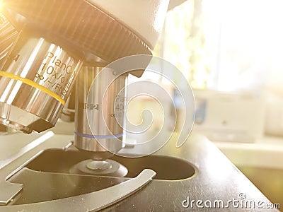 Optical microscope - science and laboratory equipment. For conducting planned, research experiments, educational demonstrations in Stock Photo