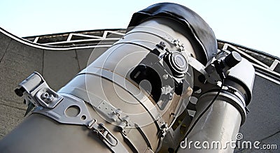 Newtonian reflector telescope under dome of astronomic observatory Stock Photo