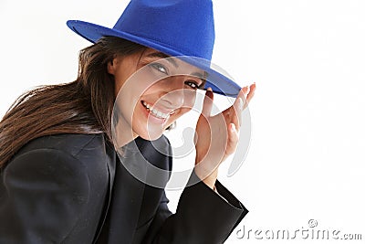 Optimistic happy woman in blue hat posing isolated Stock Photo