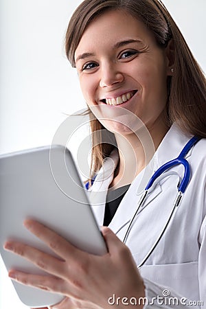 Optimistic medical professional embraces digital tools Stock Photo
