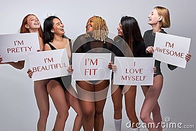 optimistic young models of different body size for bodypositive Stock Photo