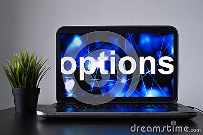 Options, trading on the stock exchange, concept. Laptop on the table Stock Photo