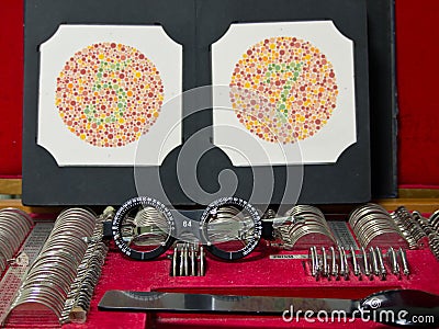 Optometry lens, eyeglasses and color blind test Stock Photo