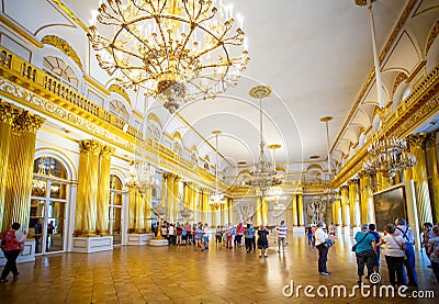 Opulent gold chandaliered state room in The Hermitage Museum in St Petersburg, Russia Editorial Stock Photo