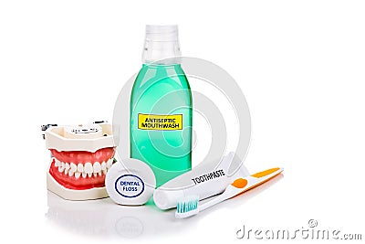 Oral care essential products tapered toothbrush, toothpaste, mouthwash, dental floss Stock Photo