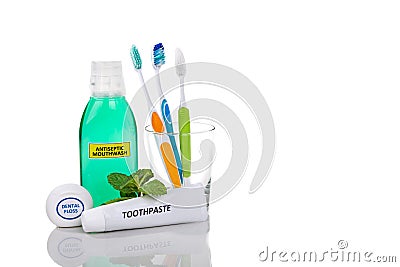 Oral care essential products tapered toothbrush, toothpaste, mouthwash, dental floss Stock Photo