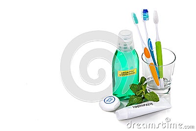 Oral care essential products tapered toothbrush, toothpaste, mouthwash, dental floss Stock Photo