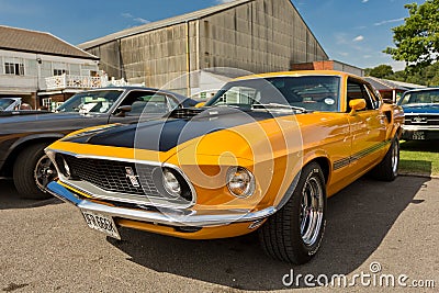 An orange 1969 Ford Mustang Shelby Editorial Stock Photo