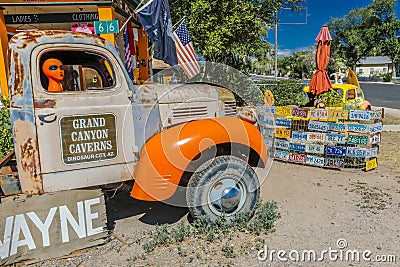 Orange Alien on Main Street in pickup truck, Seligman on historic Route 66, Arizona, USA, July 22, 2016 Editorial Stock Photo