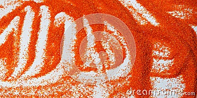 Orange artificial sand for sand therapy on a white table Stock Photo