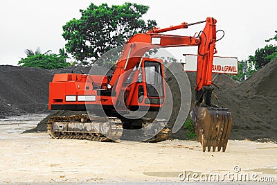 Orange back hoe Stock Photo