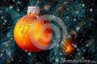 Orange balls on spruce, part of the Christmas tree with Christmas decorations Stock Photo